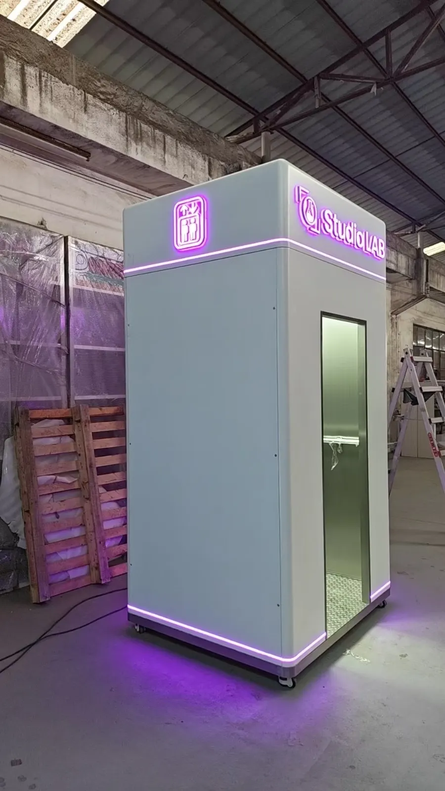 The Elevator booth, lit up in purple